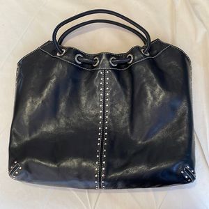 Michael Kors black leather studded tote.